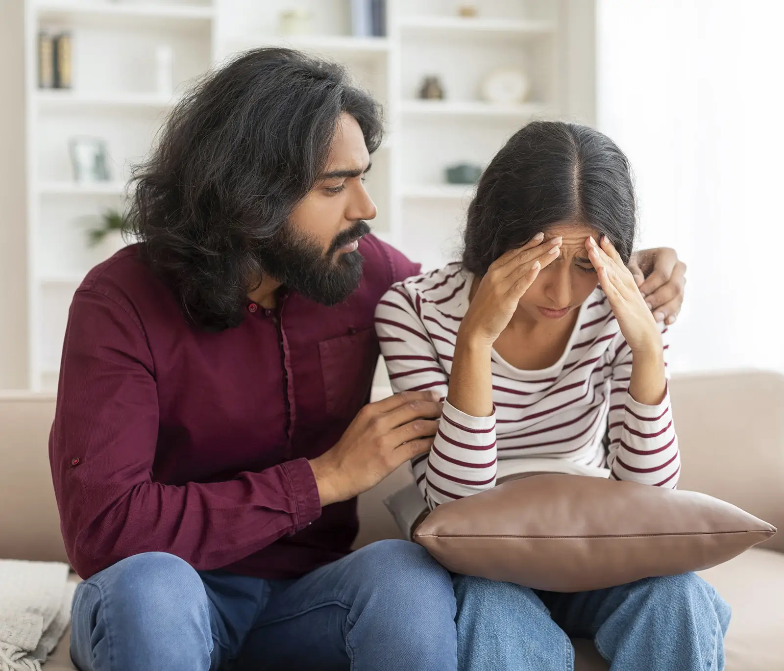 husband-comforting-his-crying-depressed